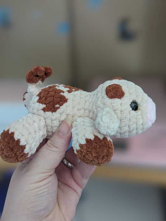 Laying cow plushie