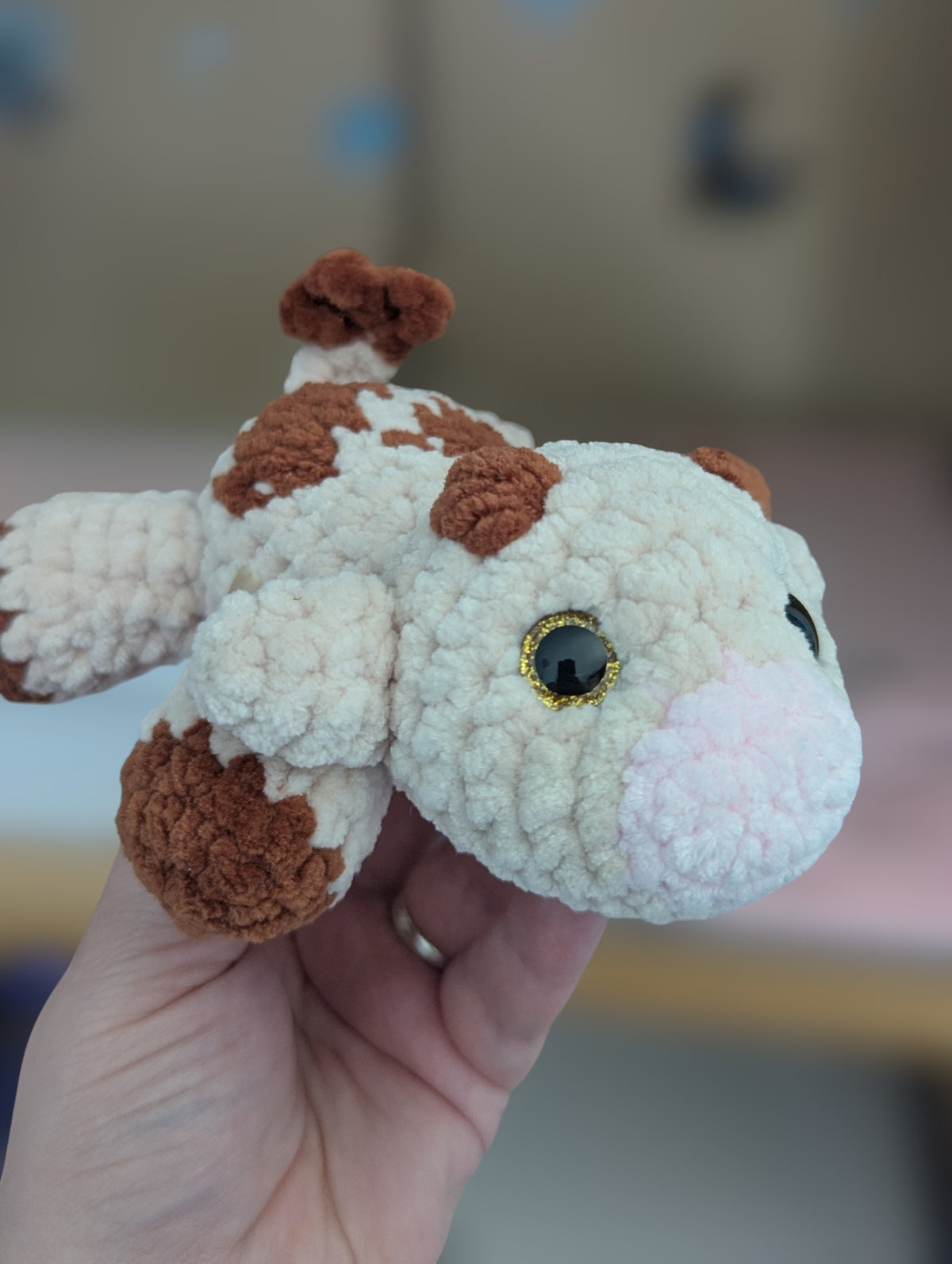 Laying cow plushie