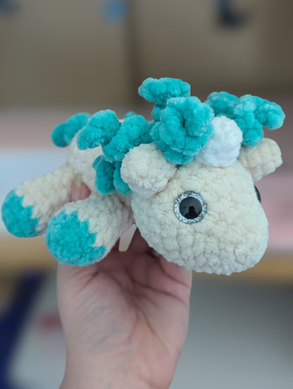 Laying unicorn plushie