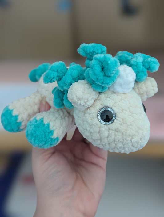 Laying unicorn plushie