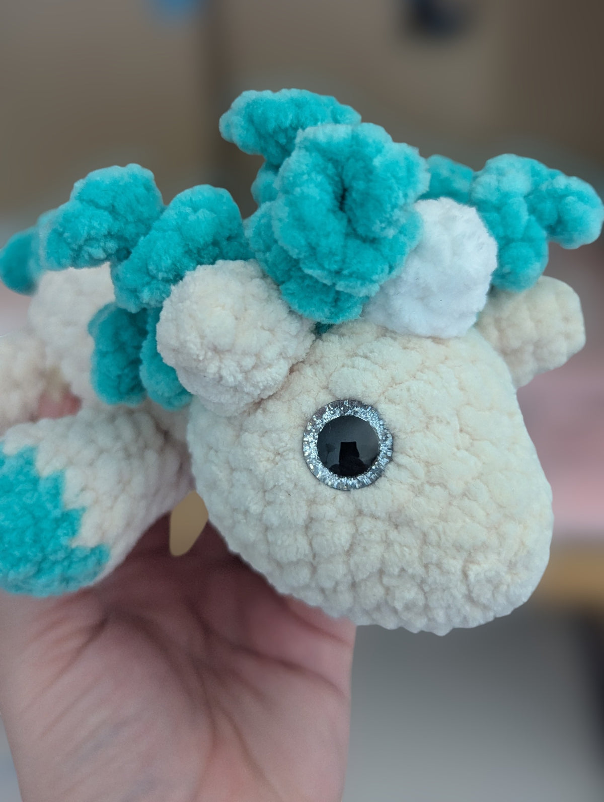 Laying unicorn plushie